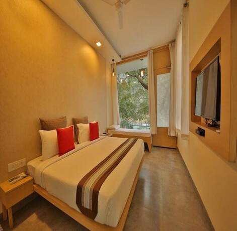 Imagen de la habitación del Hotel Namami Ganges Resort. Foto 18