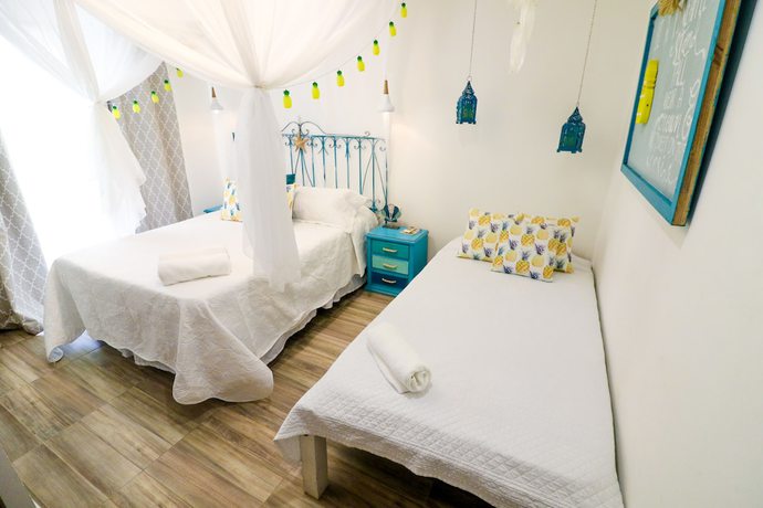 Imagen de la habitación del Hotel Namaste Beach Club and. Foto 16