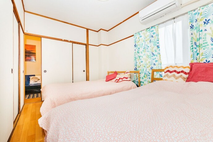 Imagen de la habitación del Hotel Namba Sunshine Apartment. Foto 13