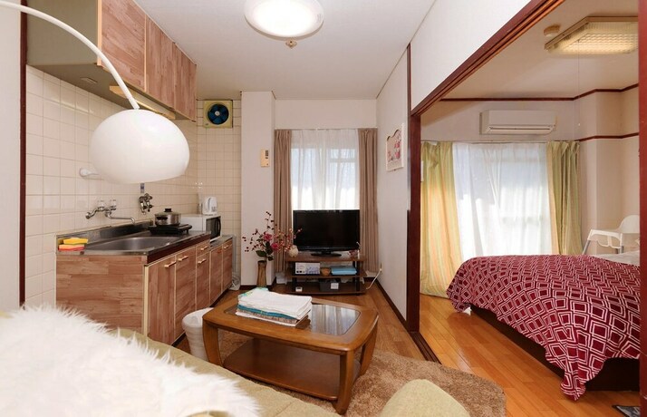 Imagen de la habitación del Hotel Namba Sunshine Apartment. Foto 14