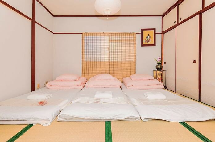 Imagen de la habitación del Hotel Namba Sunshine Apartment. Foto 17