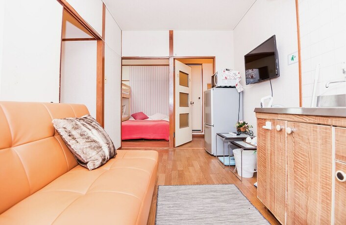Imagen de la habitación del Hotel Namba Sunshine Apartment. Foto 21