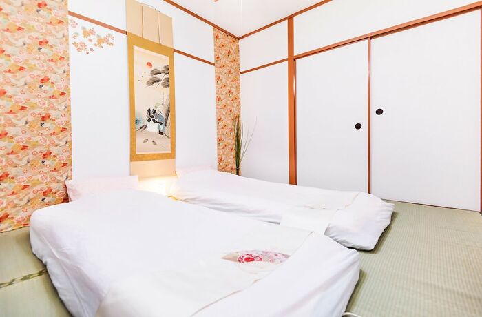 Imagen de la habitación del Hotel Namba Sunshine Apartment. Foto 22