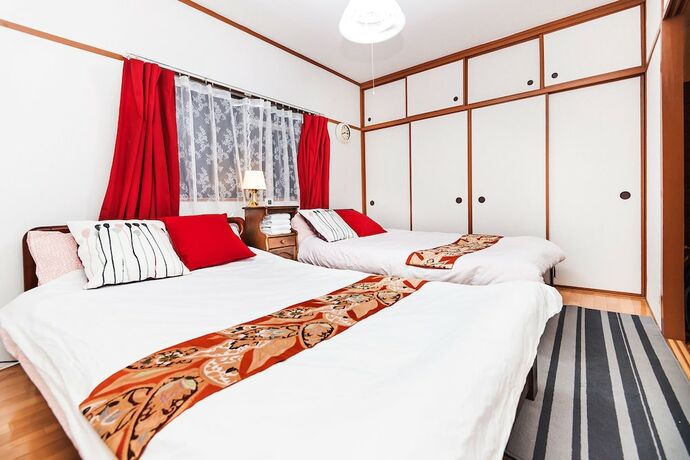 Imagen de la habitación del Hotel Namba Sunshine Apartment. Foto 30