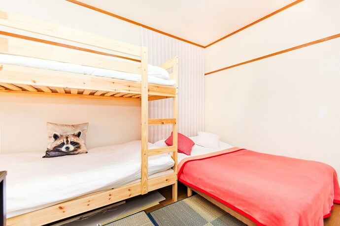 Imagen de la habitación del Hotel Namba Sunshine Apartment. Foto 31