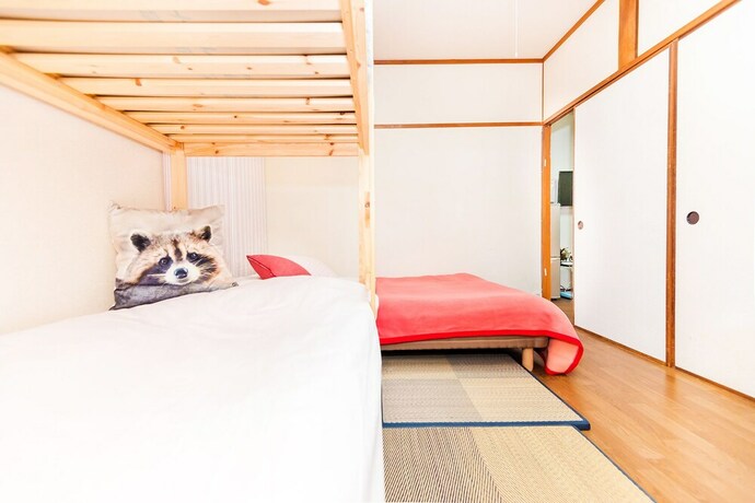 Imagen de la habitación del Hotel Namba Sunshine Apartment. Foto 32