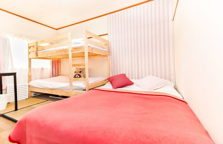 Imagen de la habitación del Hotel Namba Sunshine Apartment. Foto 33