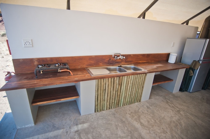 Imagen de la habitación del Hotel Namib Desert Lodge. Foto 17