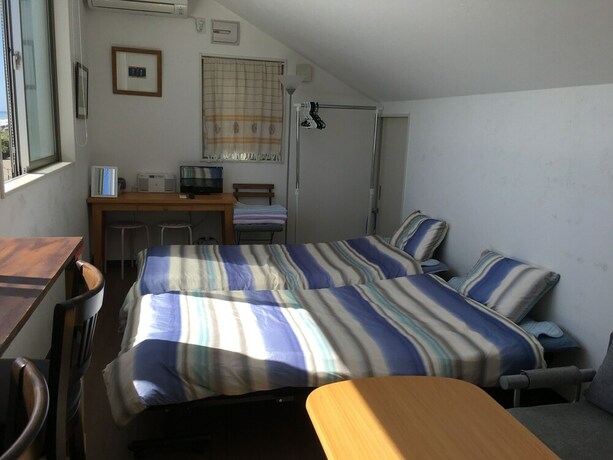 Imagen de la habitación del Hotel Namioto Biyori. Foto 20