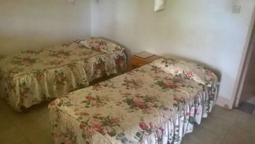 Imagen de la habitación del Hotel Namirembe Guesthouse Kampala. Foto 17