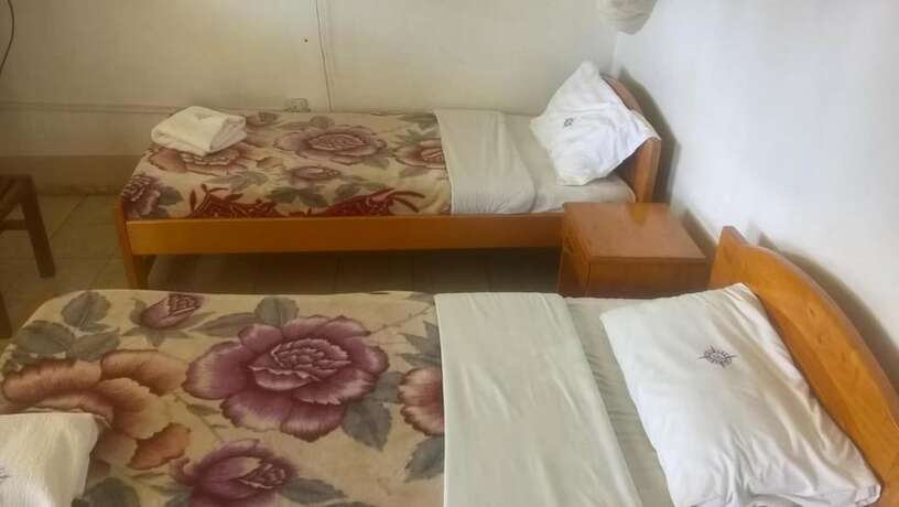 Imagen de la habitación del Hotel Namirembe Guesthouse Kampala. Foto 19