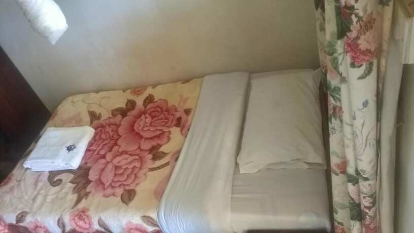 Imagen de la habitación del Hotel Namirembe Guesthouse Kampala. Foto 20
