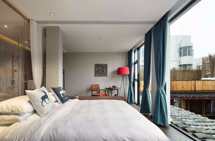 Imagen de la habitación del Hotel Namoo Wuzhen. Foto 6