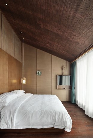 Imagen de la habitación del Hotel Namoo Wuzhen. Foto 13
