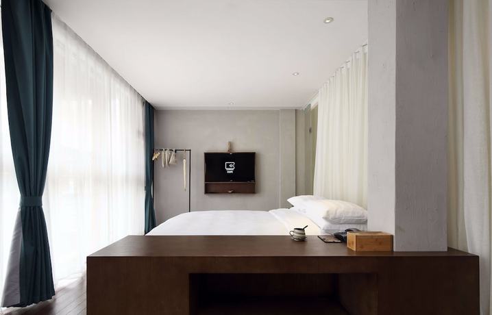 Imagen de la habitación del Hotel Namoo Wuzhen. Foto 15