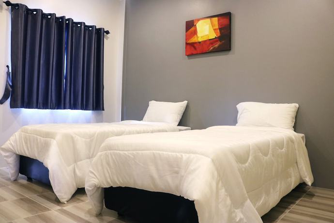Imagen de la habitación del Hotel N&N HOUSE Laem Hin by ZUZU. Foto 10