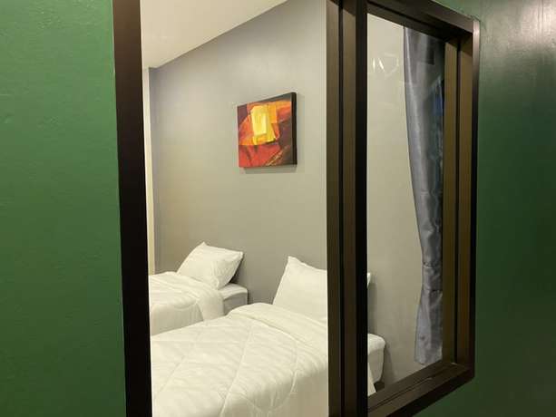 Imagen de la habitación del Hotel N&N HOUSE Laem Hin by ZUZU. Foto 15