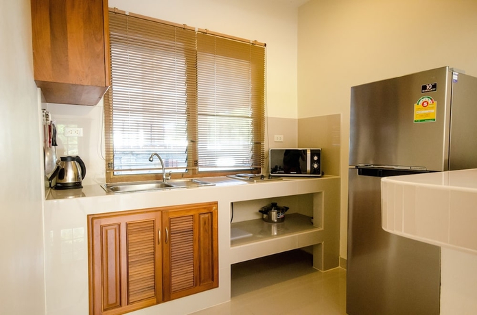 Imagen de la habitación del Hotel Namphung Phuket Boutique Resort. Foto 8