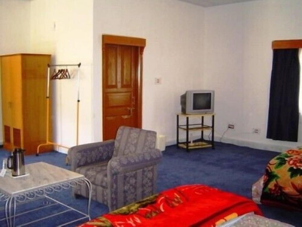 Imagen de la habitación del Hotel Namsay Chholing Resort. Foto 11