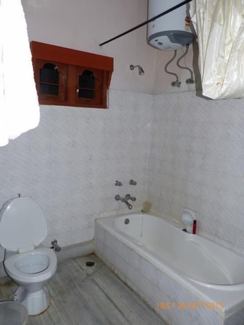 Imagen de la habitación del Hotel Namsay Chholing Resort. Foto 13