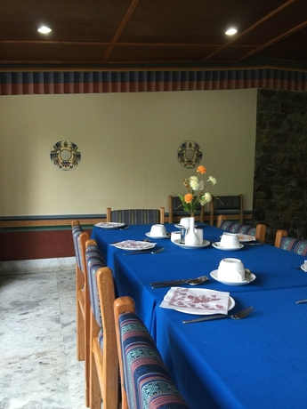 Imagen del bar/restaurante del Hotel Namsay Chholing Resort. Foto 3