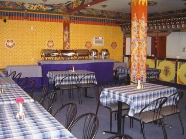 Imagen del bar/restaurante del Hotel Namsay Chholing Resort. Foto 4