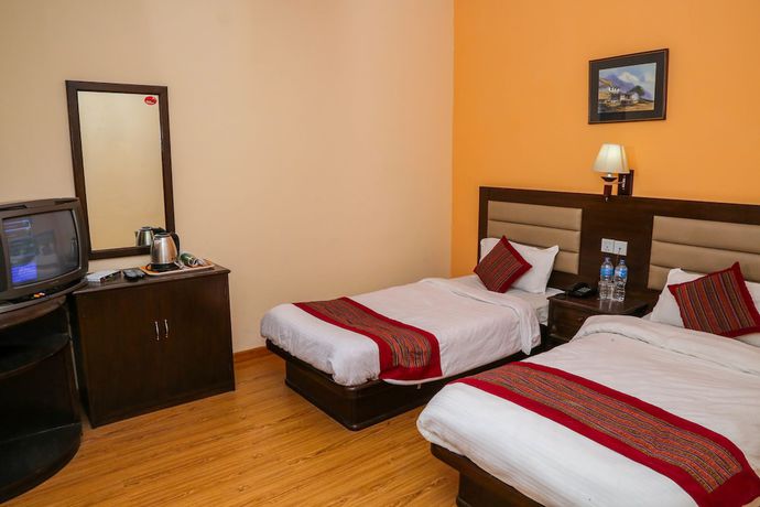 Imagen de la habitación del Hotel Namtso. Foto 14