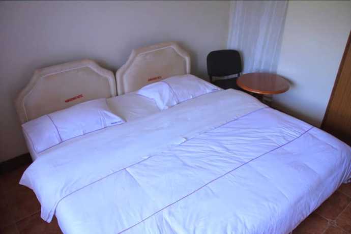Imagen de la habitación del Hotel Namugongo. Foto 11