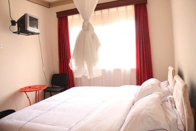 Imagen de la habitación del Hotel Namugongo. Foto 13