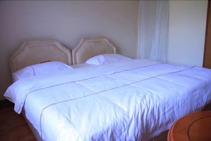 Imagen de la habitación del Hotel Namugongo. Foto 17