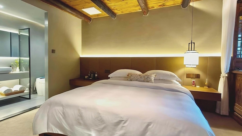 Imagen de la habitación del Hotel Nan Court - Nanyuan,Leshan. Foto 2