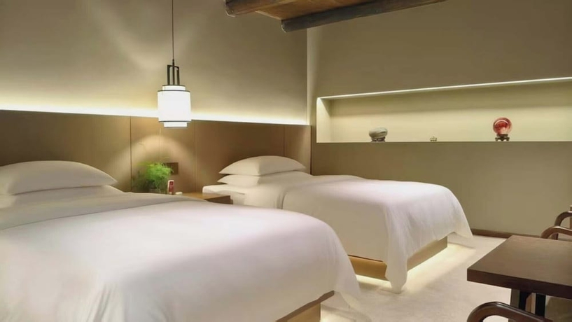 Imagen de la habitación del Hotel Nan Court - Nanyuan,Leshan. Foto 4