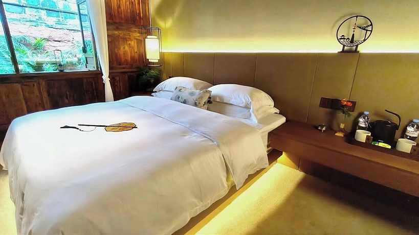 Imagen de la habitación del Hotel Nan Court - Nanyuan,Leshan. Foto 8