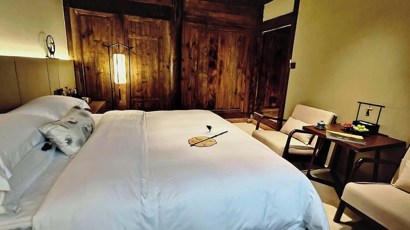 Imagen de la habitación del Hotel Nan Court - Nanyuan,Leshan. Foto 9