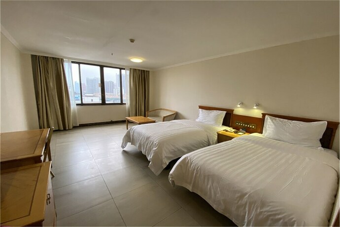 Imagen de la habitación del Hotel Nan Fang Da Sha. Foto 12