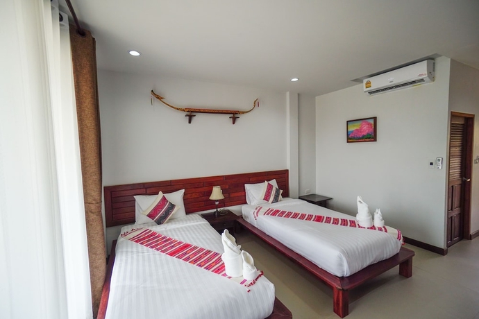 Imagen de la habitación del Hotel Nan Green Lake View Resort. Foto 9