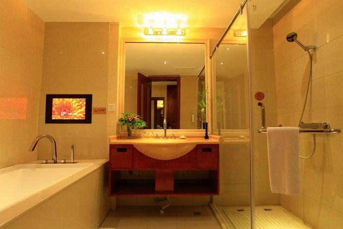 Imagen de la habitación del Hotel Nan Guo. Foto 8