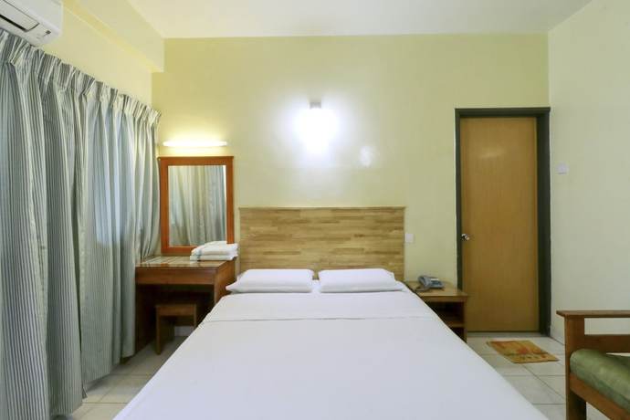 Imagen de la habitación del Hotel Nan Yeang Hotel. Foto 7