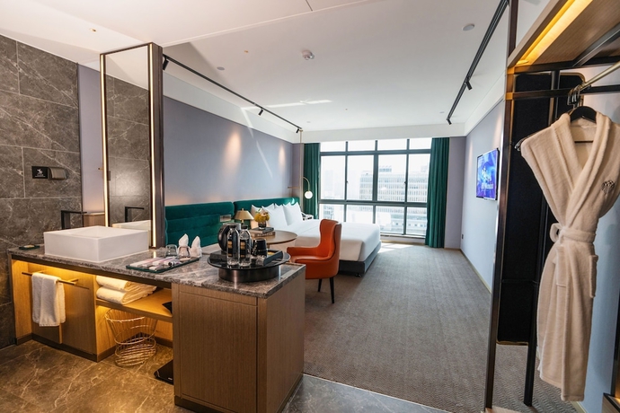 Imagen de la habitación del Hotel NanNing Mandala. Foto 7