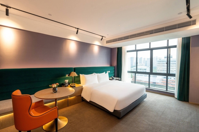 Imagen de la habitación del Hotel NanNing Mandala. Foto 8