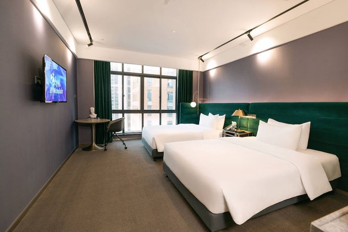 Imagen de la habitación del Hotel NanNing Mandala. Foto 10
