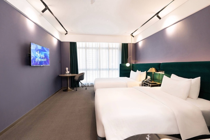 Imagen de la habitación del Hotel NanNing Mandala. Foto 11