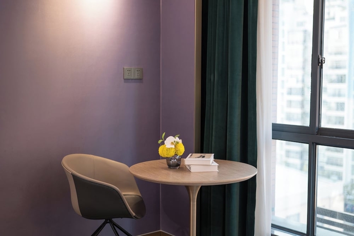 Imagen de la habitación del Hotel NanNing Mandala. Foto 12