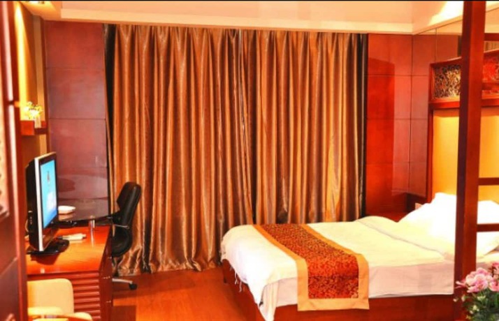 Imagen de la habitación del Hotel Nanchang Aijia. Foto 12