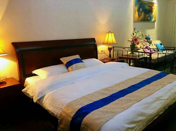 Imagen de la habitación del Hotel Nanchang Chenyiju Apartment. Foto 16
