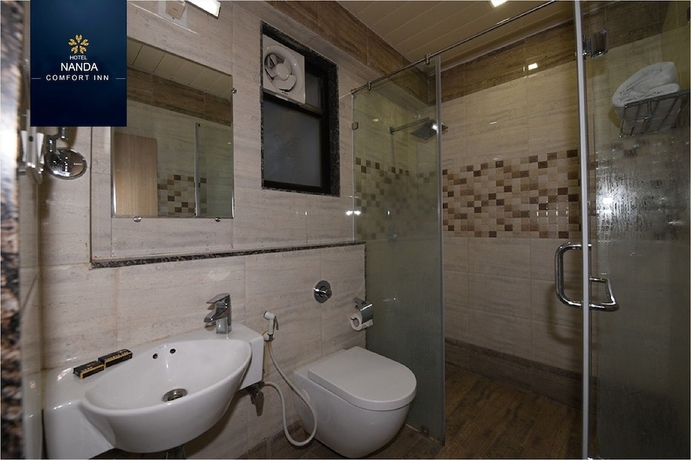 Imagen de la habitación del Hotel Nanda Comfort Inn. Foto 11