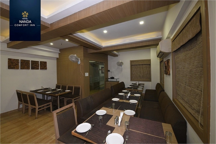 Imagen del bar/restaurante del Hotel Nanda Comfort Inn. Foto 2