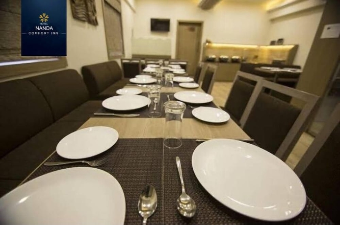 Imagen del bar/restaurante del Hotel Nanda Comfort Inn. Foto 3
