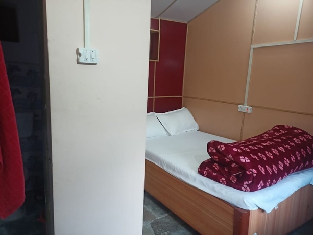 Imagen de la habitación del Hotel Nanda Devi Home Stay. Foto 11