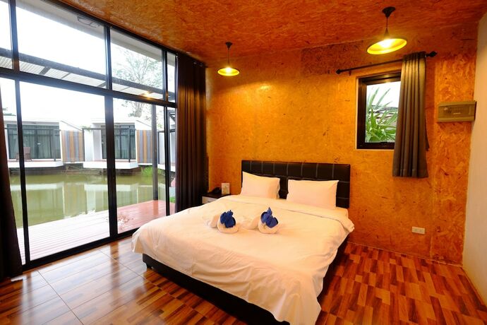 Imagen de la habitación del Hotel Nandc Resort. Foto 15